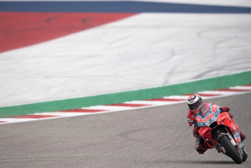 TX - APRIL 21:  Andrea Dovizioso of Italy and Ducati Team leads the field during  the MotoGP qualifying practice during the MotoGp Red Bull U.S. Grand Prix of The Americas - Qualifying at Circuit of The Americas on April 21